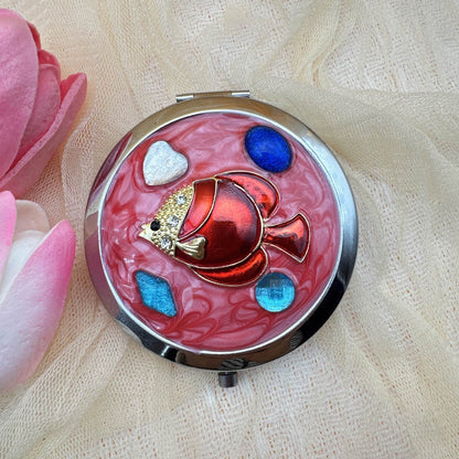 Portable Make-Up Folding Mirror – Compact & Travel-Friendly (Random Design-Pack of 1)