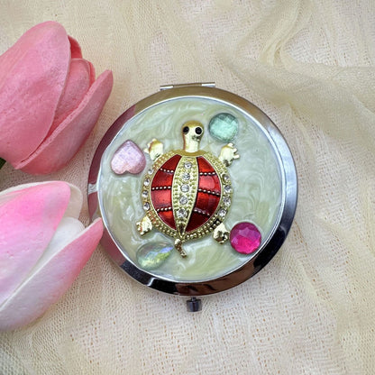 Portable Make-Up Folding Mirror – Compact & Travel-Friendly (Random Design-Pack of 1)